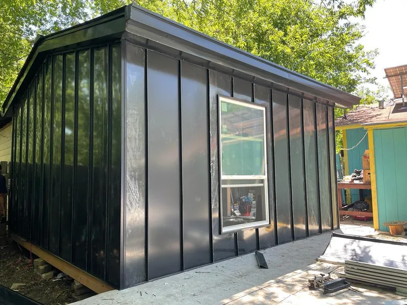 Black standing seam metal wall panels for Roof Inspection in Waldoboro